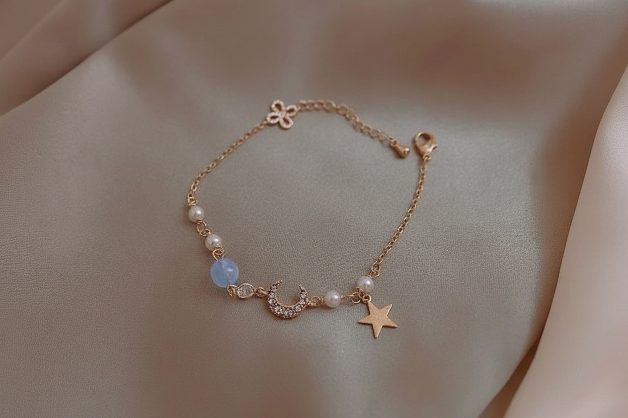 Gold Star & Moon Bracelet Hero Image